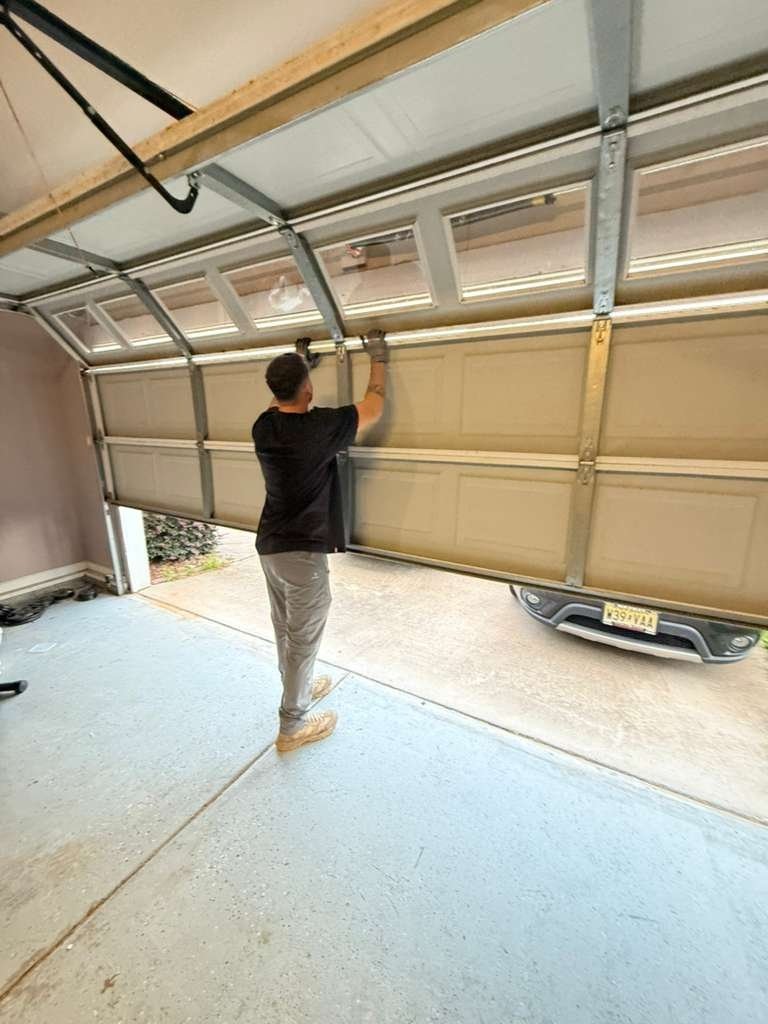 Garage Door Roller Replacement work on a garage door